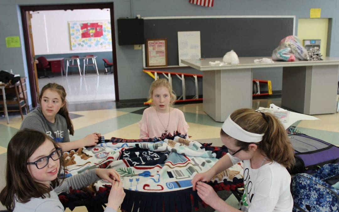 SLAM Students Create Blankets for Camp Erin
