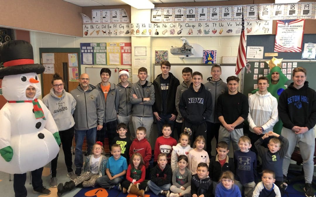 Boys Basketball Reads at Miller Hill-Sand Lake Elementary
