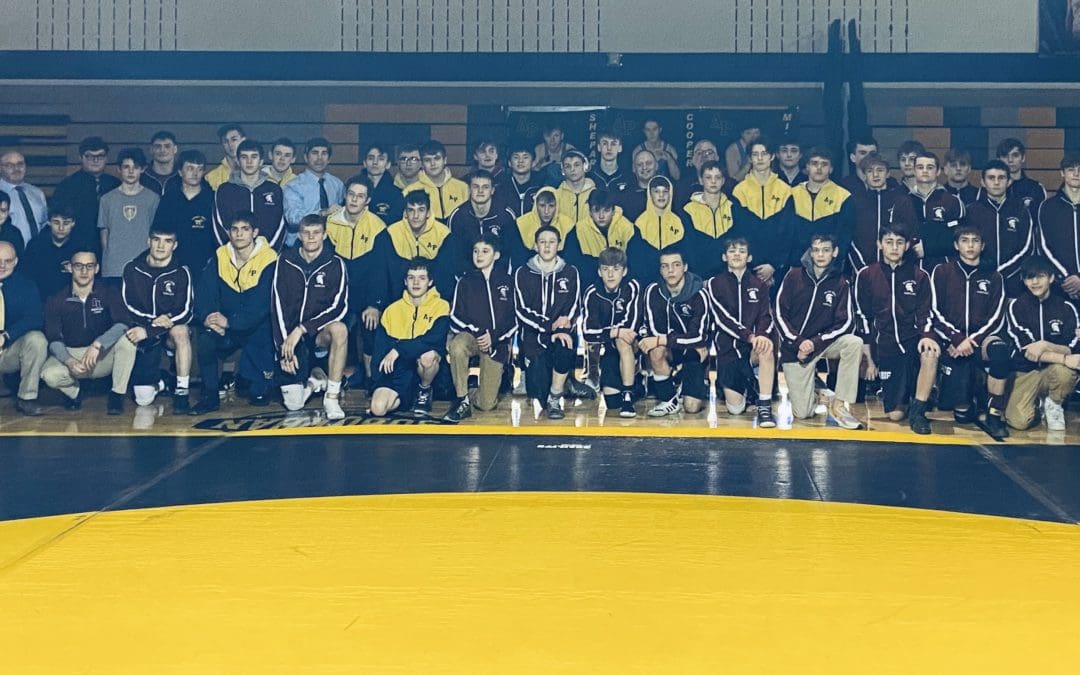 group photo of wrestling teams