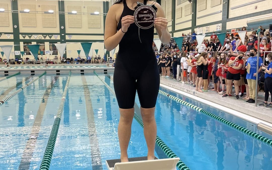 swimmer on podium