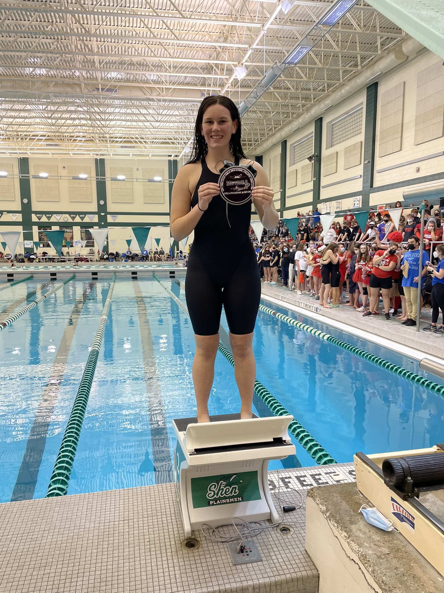 swimmer on podium